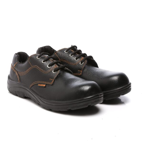 A pair of 9015 Safety Shoe in black leather work shoes with orange stitching, black laces, and sturdy, non-slip rubber soles. These Agarson safety shoes feature reinforced toe caps and a padded collar for added comfort and protection.