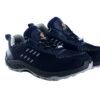 A pair of navy blue athletic A-007 Safety shoe from Agarson Safety Shoe, boasting black and gray soles and a mesh design with white stitch detailing and a logo on the tongue. These stylish shoes are displayed against a plain white background.