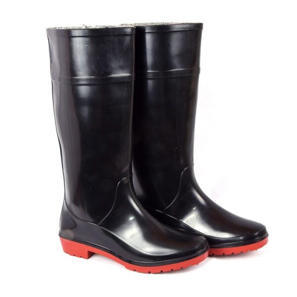 A pair of ceaser safety gumboot, Shiny black agarsongumboots with a sleek design, featuring a slightly ridged red sole and mid-calf height. The boots are standing upright side by side on a white background.