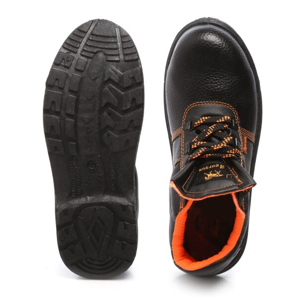 A pair of black Agarson crusher safety shoe with orange interior lining and accents on the laces and stitching. The shoes have a textured surface and thick soles, designed for durability and protection.