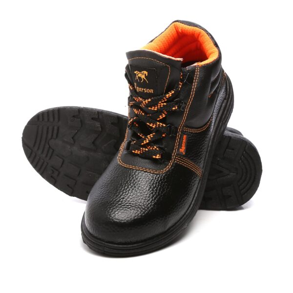 A pair of black Agarson crusher safety shoe with orange interior lining and accents on the laces and stitching. The shoes have a textured surface and thick soles, designed for durability and protection.