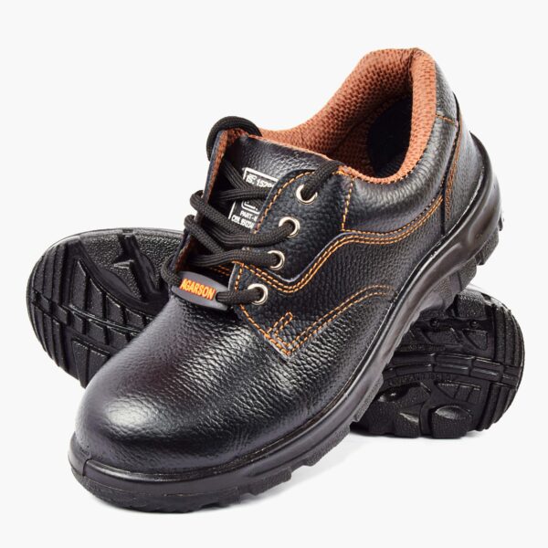 A pair of Desire Safety Shoe in black leather safetyshoes with orange accents, including stitching and a padded collar. The shoes feature sturdy, textured rubber soles, metal eyelets, and laces. There is a small tag with the word "DESIRE" on the side, showcasing Agarson Safety Shoe commitment to quality and protection.