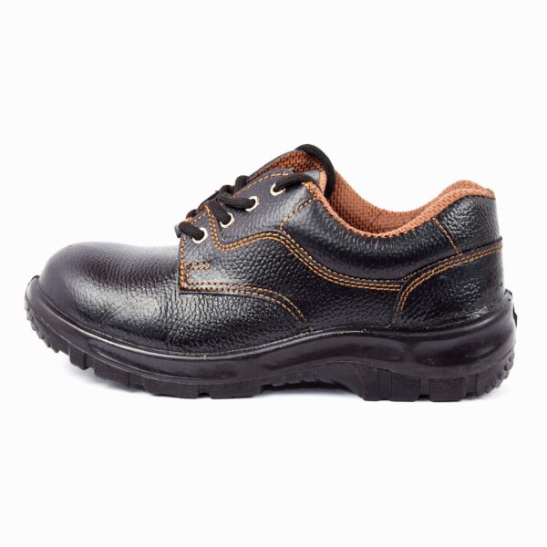 A single shoe of Desire Safety Shoe in black leather safetyshoes with orange accents, including stitching and a padded collar. The shoes feature sturdy, textured rubber soles, metal eyelets, and laces. There is a small tag with the word "DESIRE" on the side, showcasing Agarson Safety Shoe commitment to quality and protection.