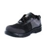 A Single shoe of black and dark grey Agarson hyryder safety shoe with mesh detailing. The shoes have thick, black rubber soles, lace-up closures, pull tabs on the heels, and a small logo visible on the tongues featuring an orange and black design. These safety shoes are positioned side by side.