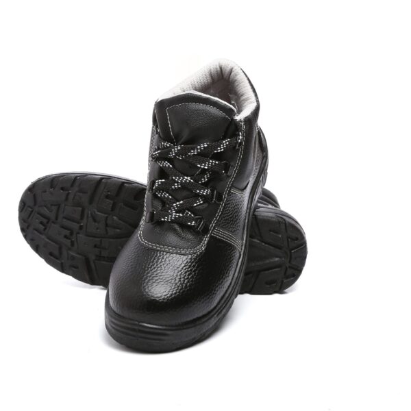 A pair of black work boots by AgarsonFootwear, featuring white stitching details, textured sides, and thick, rugged black soles. The boots have black and white checkered laces and are designed with a high ankle for added support. Perfect safety shoes for any demanding job.