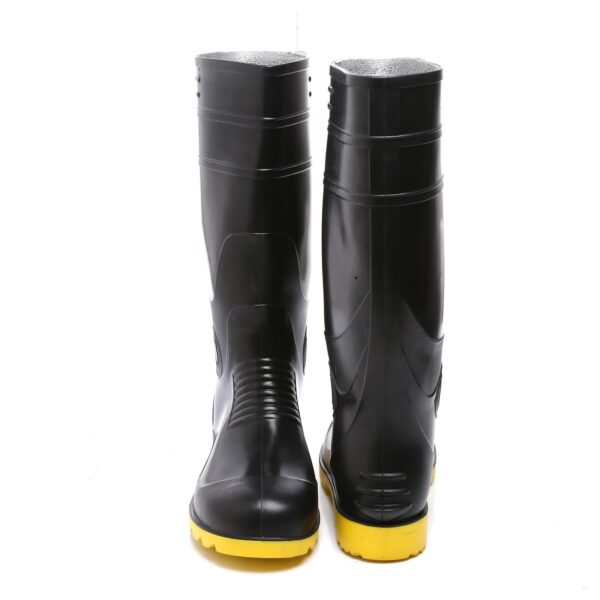 A pair of Supergold gumboot shiny black safetygumboot with yellow soles. The boots are tall, reaching just below the knee, and have textured treads for better grip. The design features reinforced areas around the ankles and tops for additional support and durability.