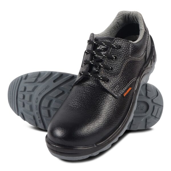 A pair of Thunder safety shoe in black steel-toe safetyshoes with lace-up closures and gray cushioned soles. The shoes feature a rugged design with reinforced toe caps and textured leather uppers, embodying the durability synonymous with Agarson Safety Shoe.